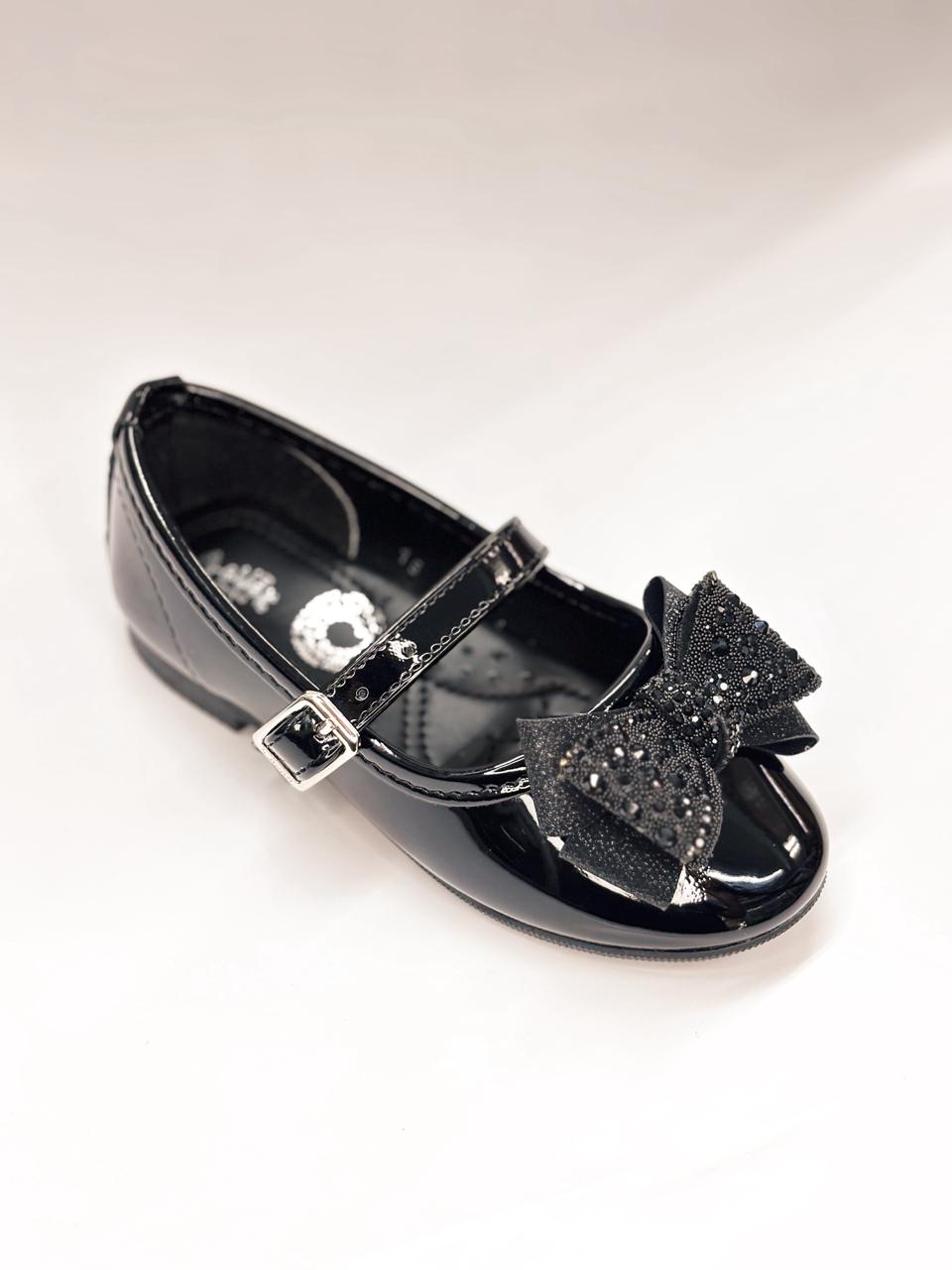 Balerina con moño y hebilla