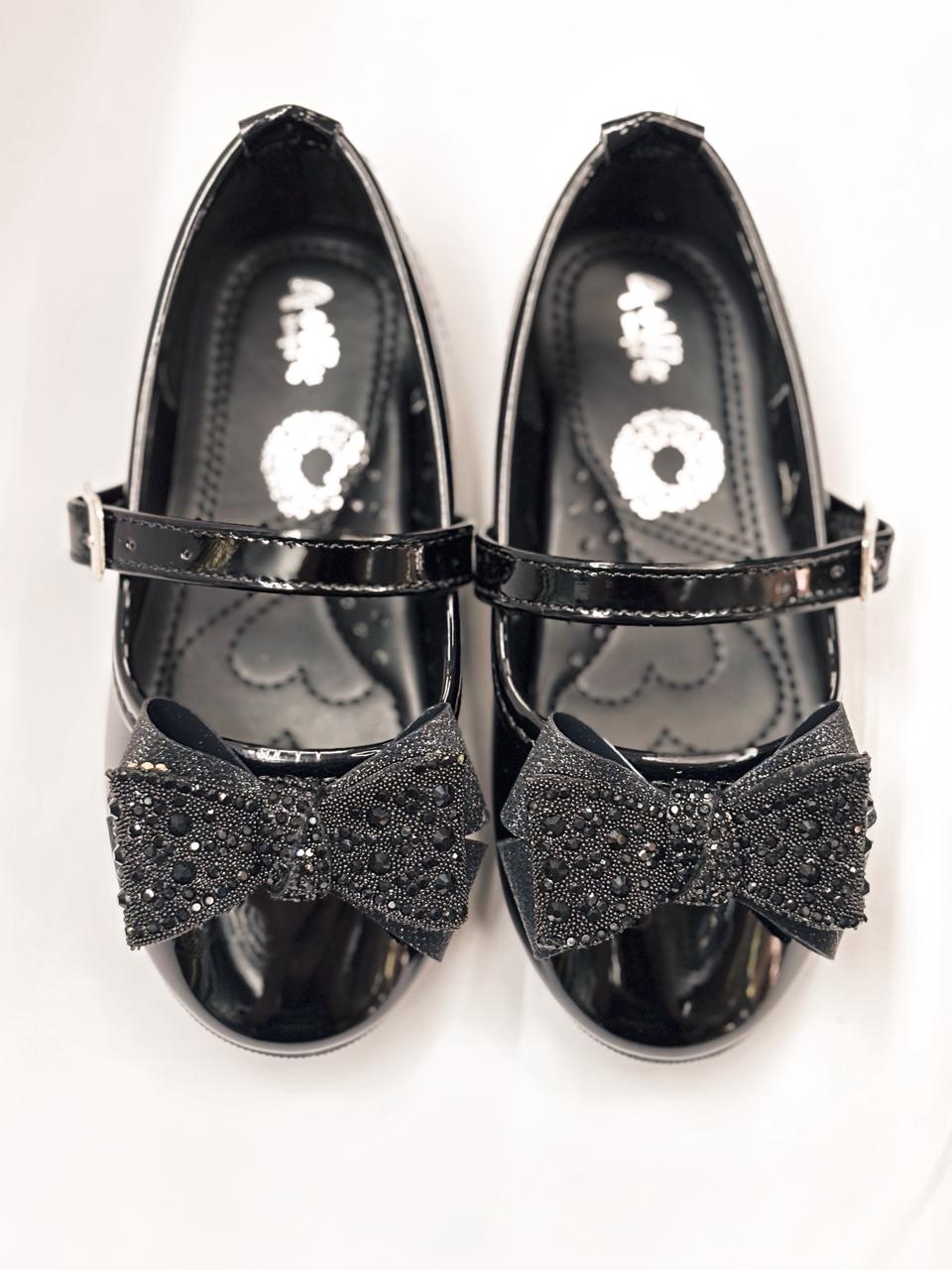 Balerina con moño y hebilla