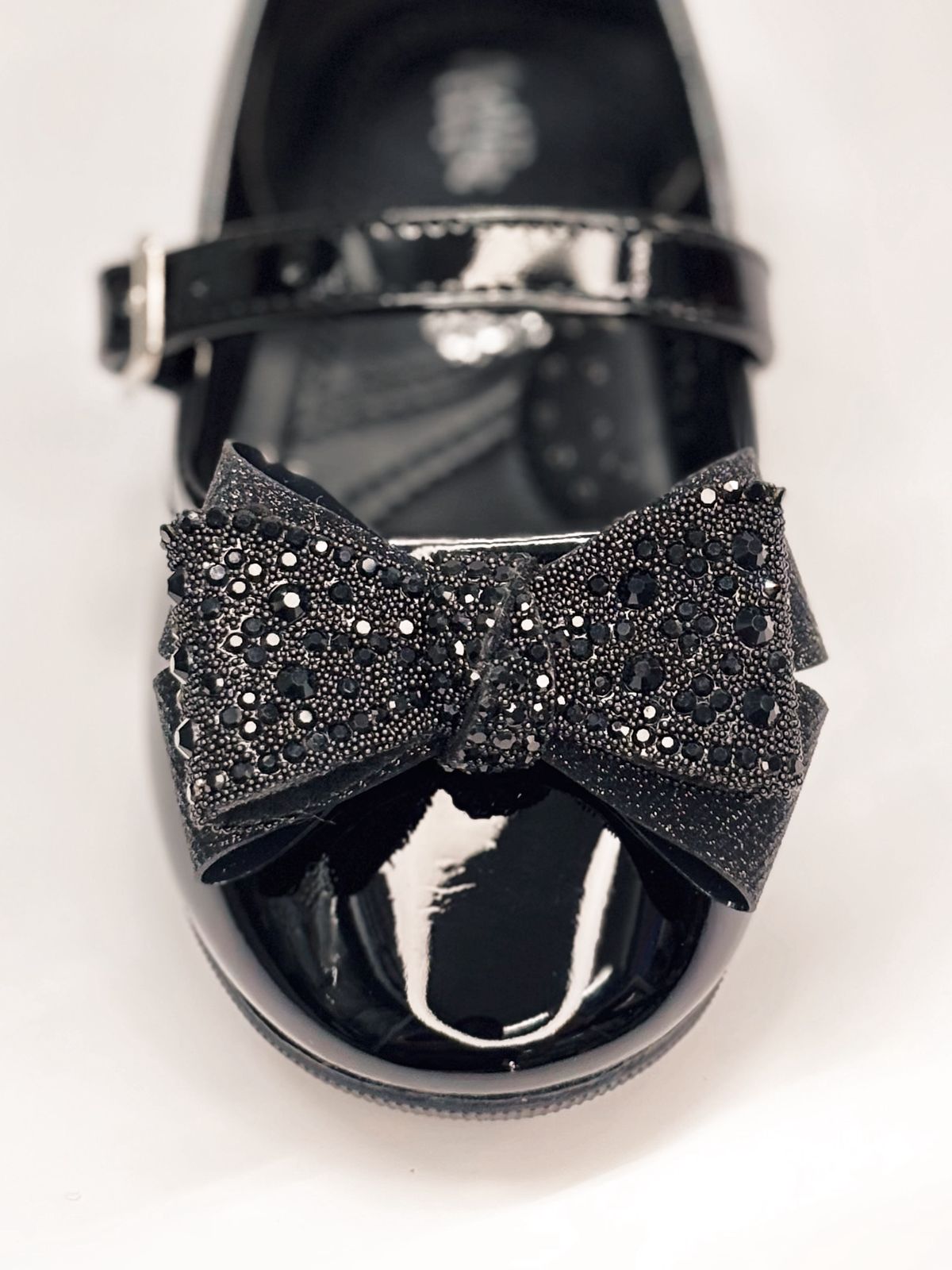 Balerina con moño y hebilla