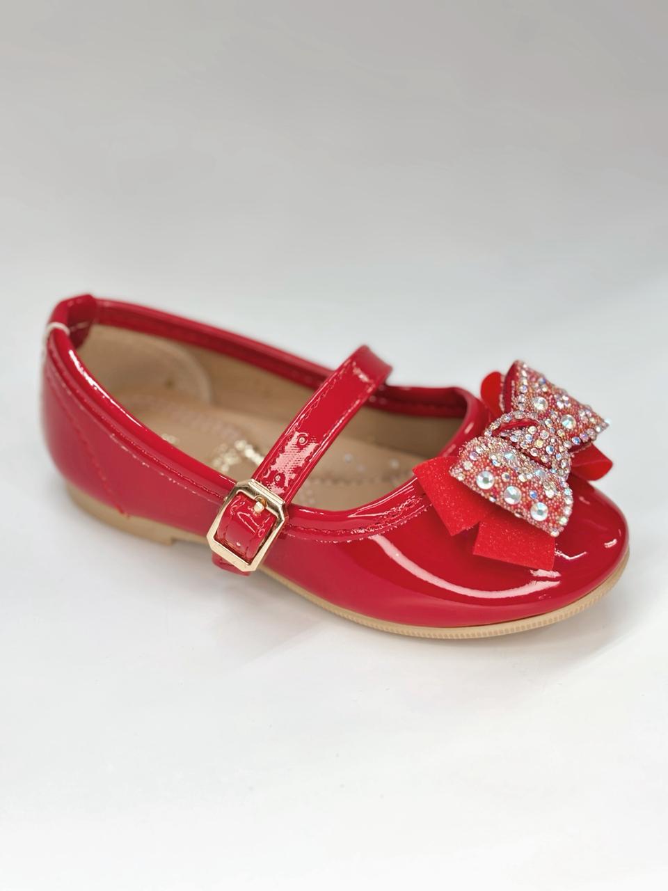 Balerina con moño y hebilla