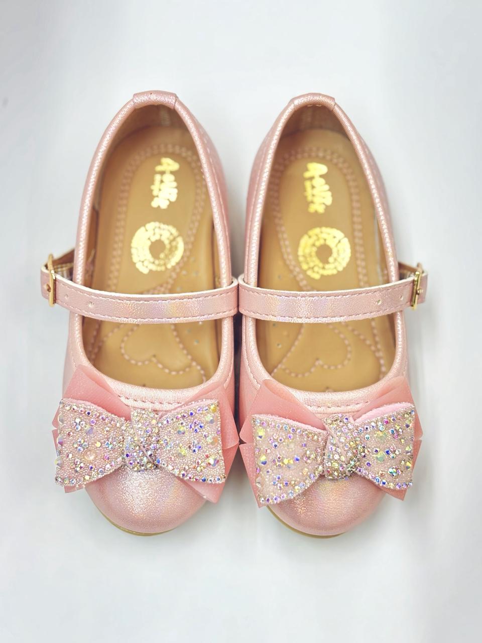 Balerina con moño y hebilla