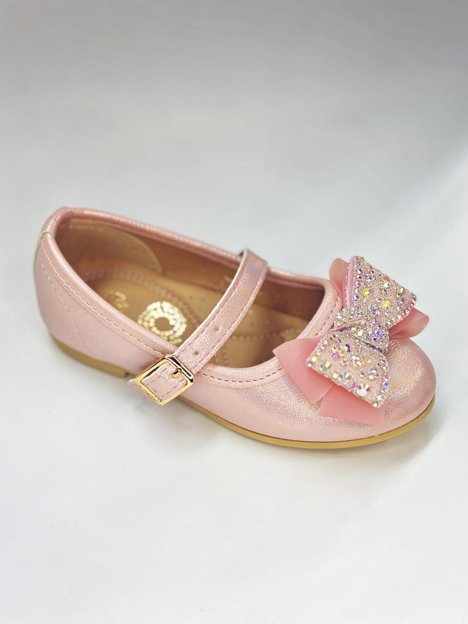 Balerina con moño y hebilla