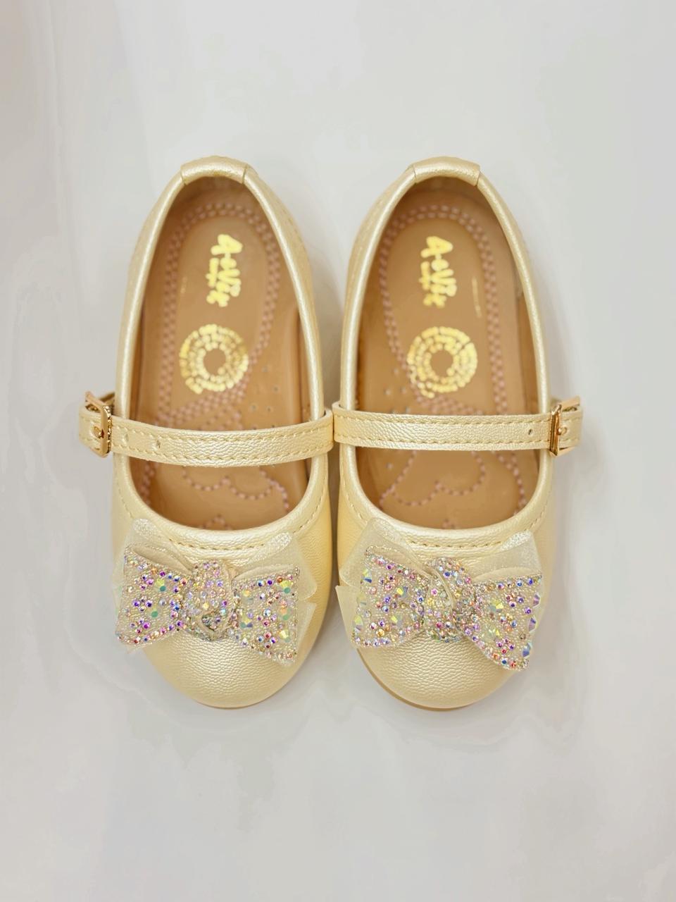 Balerina con moño y hebilla