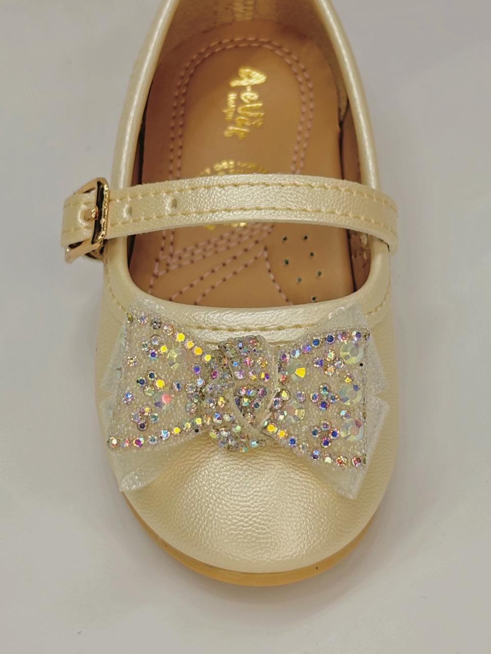 Balerina con moño y hebilla