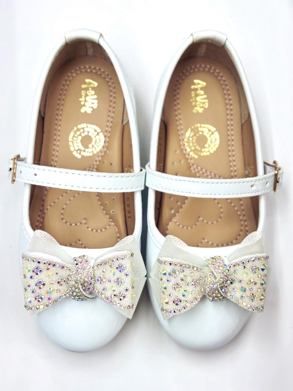 Balerina con moño y hebilla