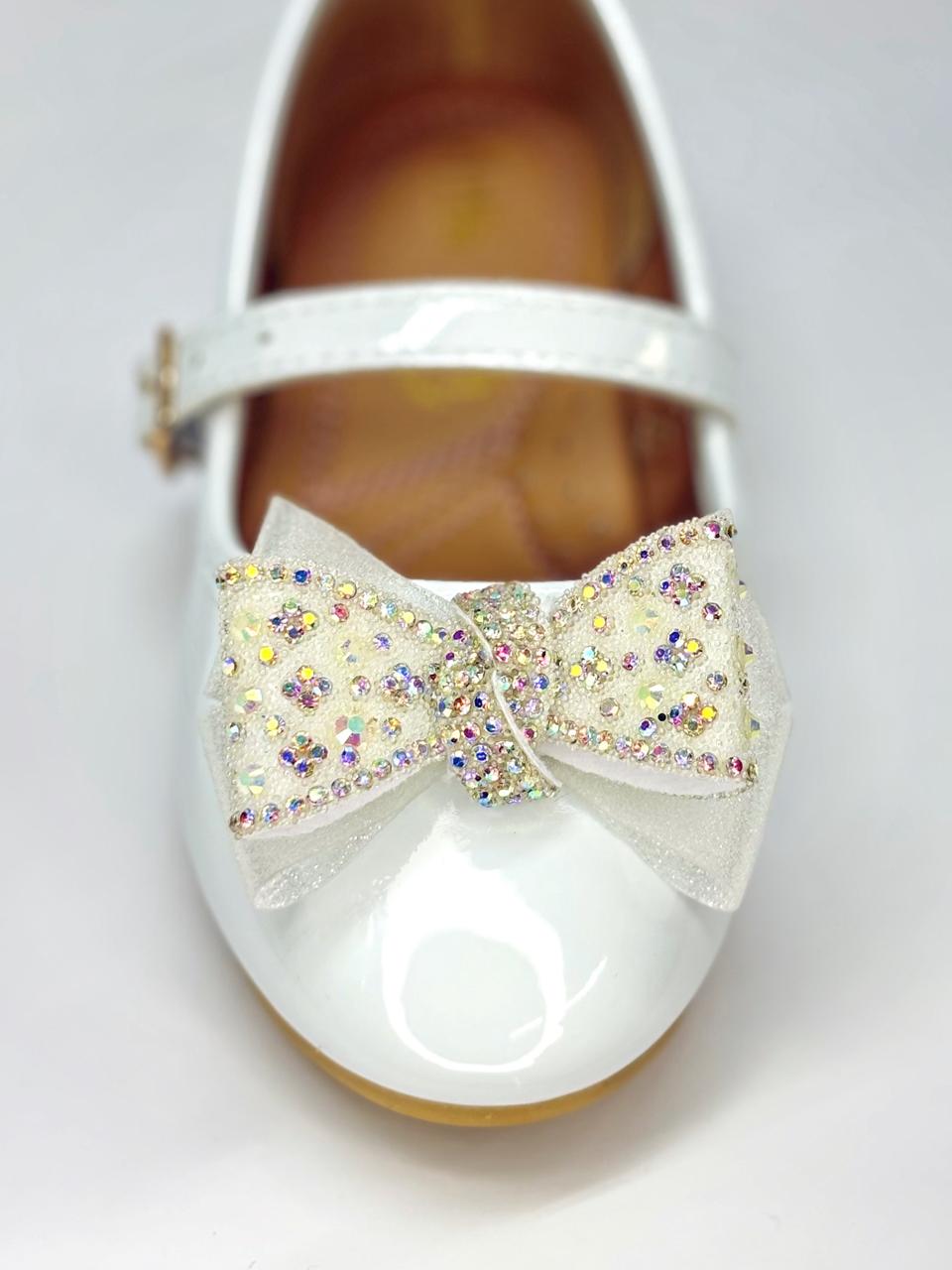 Balerina con moño y hebilla